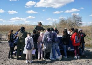 Washington State Parks Interpretive Rangers leading a station on the local watershed